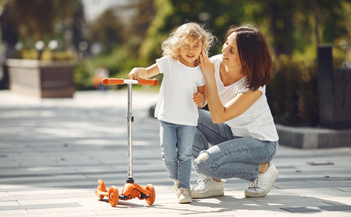 Por qué entrenar para vivir en salud. Madre e hija divirtiéndose y en forma